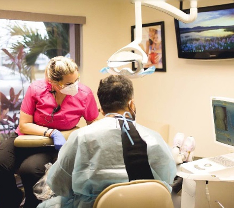 Winter Park Dental - Winter Park, FL. Winter Park dentist Dr. Mainak Patel at work at Winter Park Dental