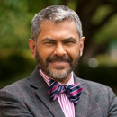 Abraham Kuruvilla, MD, PhD, FAAD