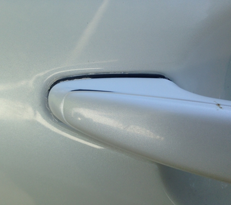 Tampa Auto Clinic - Tampa, FL. Damaged door handle