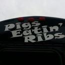 Pigs Eatin' Rib