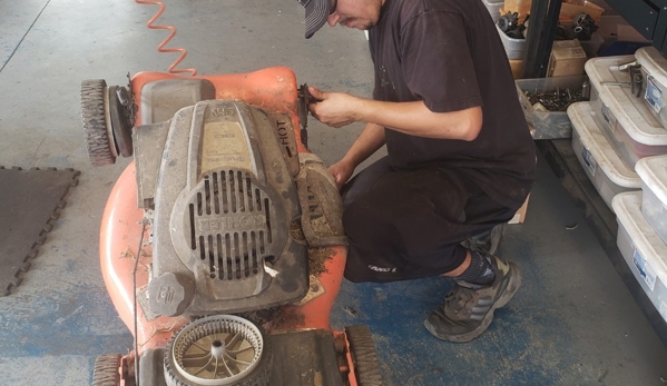 Contreras Small Engine Repair - Hanford, CA. Eric hard at work