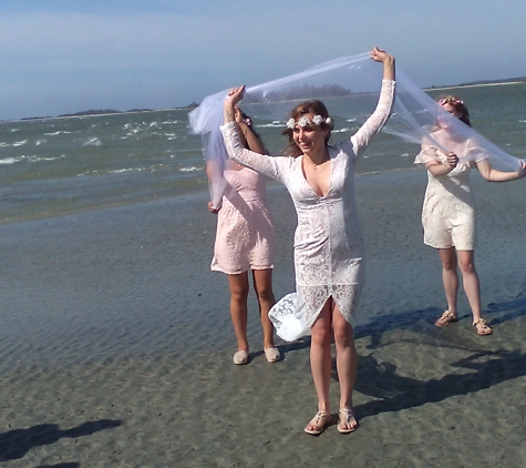 Coastal Weddings - Tybee Island, GA. Bride after beach wedding