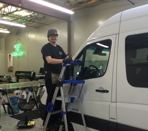Sundance Window Tinting - Denver, CO. Our installer working on 25' Mercedes sprinter van