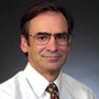 Claude Denham, M.D.