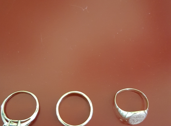 Jewelry Expressions III - Kingston, NY. 14k signet ring, wedding ring, aquamarine ring purchased 1966