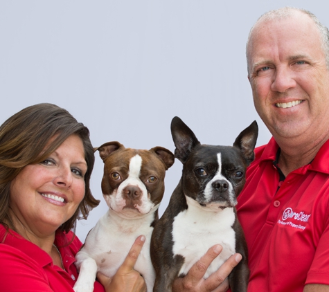 PuroClean 24hr Mitigation/Restoration Services - Brandon, FL. Owners Art & Kelly Curtis with fur babies Zoey and Rocky
