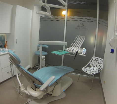 Dentist For Chickens - Swansea Dental Care - Blacksmiths, NSW