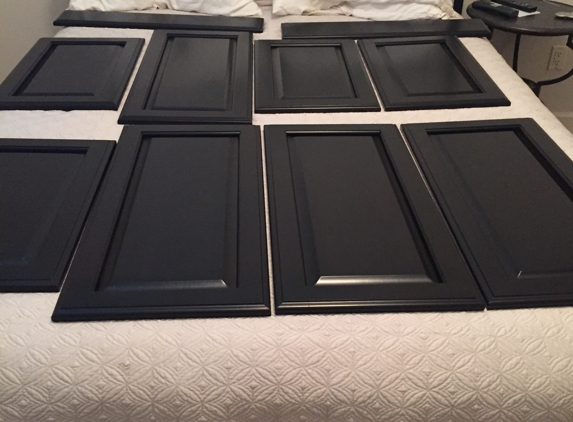 Custom Color Specialists - Redford, MI. He felt the need to put some cabinets right on a bed.  Total disregard of property.