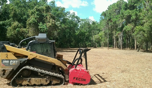 Mid Florida Land Services - Frostproof, FL. One of our machines with a Fecon forestry mulching attachment