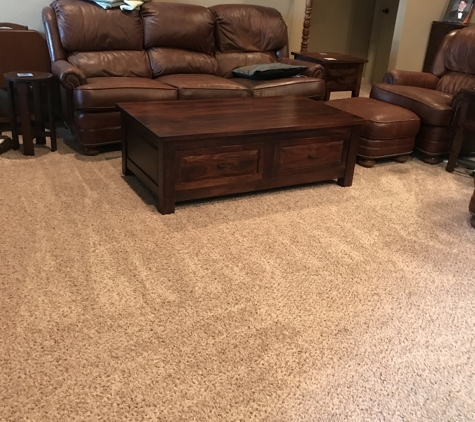 Green Steam Maids - Oak Grove, MO. Dusting with microfiber dusters and vacuuming with Shark's duo-clean rotator lift-away show case your home!