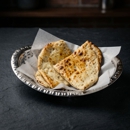 Taj Indian Cuisine & Bar - Restaurants