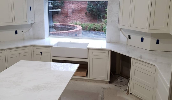 Waters' Granite - Shreveport, LA. Bianco Rhino Marble Kitchen with custom window accent!