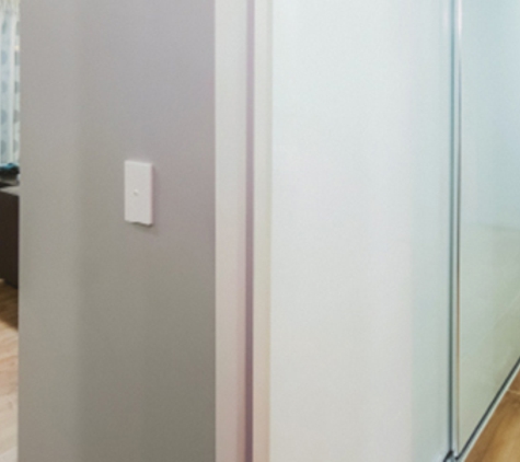 Bradnam's Windows & Doors - Mount St John, QLD. Sliding Wardrobe Door In Hallway