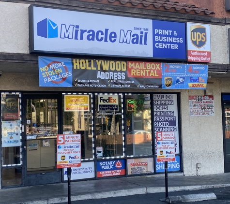 Miracle Mail Print & Business Center - Los Angeles, CA. Storefront next to Dave Hot Chicken