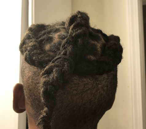 Endivo Hair Gallery - Durham, NC. She finished the style off with a crooked braid/ponytail