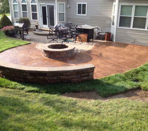Hoffman Concrete, LLC - Saint Louis, MO. Fire pit stamped patio and sitting wall