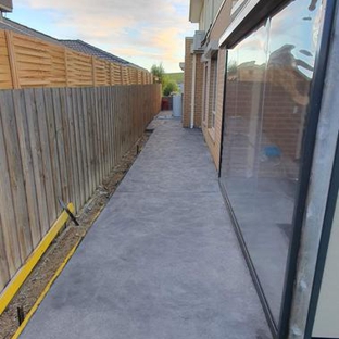 Smiley's Concrete - Thornbury, VIC. Side of the house concrete