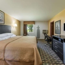 Super 8 by Wyndham Higginsville - Hotels