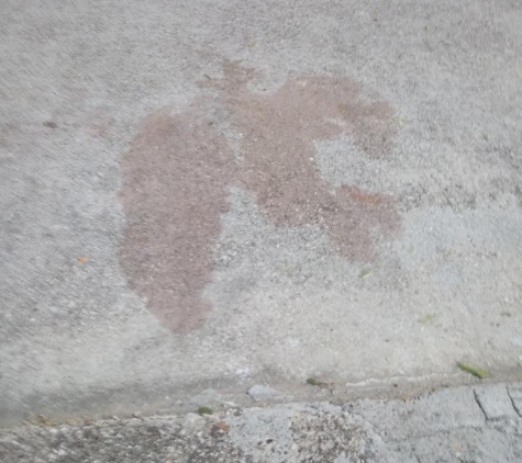 Cheepway Tree Service - Houston, TX. stain on street from leak from workers' truck