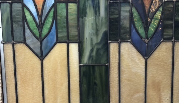 Universal Stained Glass Designs - Oak Park, MI. After:  Completed restoration of 1920s Stained glass window
