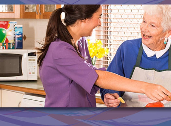 Amana Living - Cottesloe, WA. A resident with her carer preparing food in the kitchen