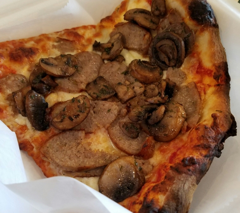 Pizza - San Antonio, TX. Sausage and mushroom pizza-this is one slice ☺️