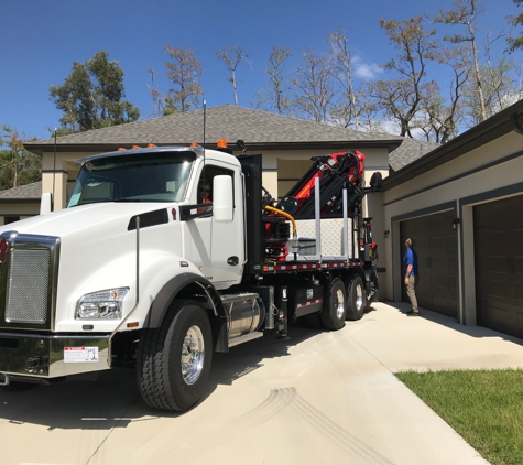 Bobcat Tractor Tree & Landscape Co - Naples, FL. Naples First Aerial Grapple Saw!