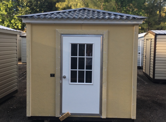 Shed Depot & Shed Guy Services - Miami Lakes, FL. Hip roof with permitile hardie board exterior nine light door