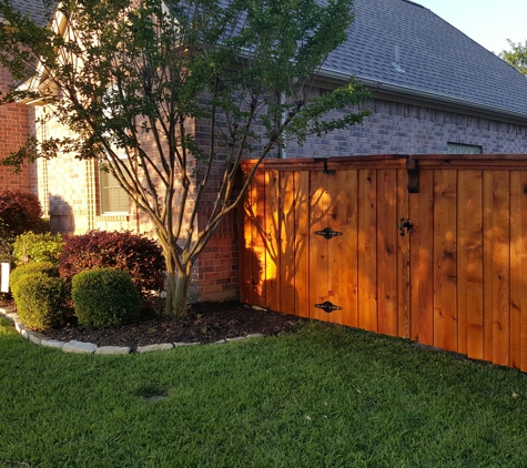 JM Fences - North Richland Hills, TX. Cedar board on board stained.