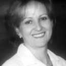Julia E Correal, DDS - Dentists