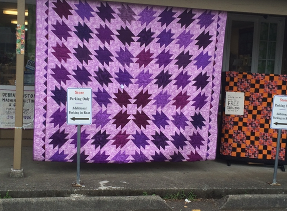 Debra's Custom Machine Quilting & Gifts - Portland, OR. They call this a "Super King size Anvil quilt.  Its HUGE and beautiful.