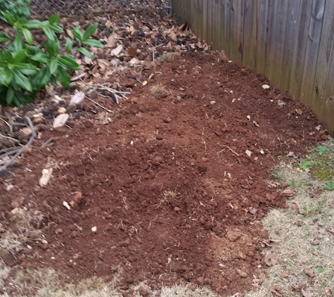 Tennessee Valley Fence - Huntsville, AL. This is the pile of dirt left in my yard from the fence crew. It's about 10 inches deep.