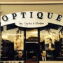 Optique by Cynthia & Christine L L C