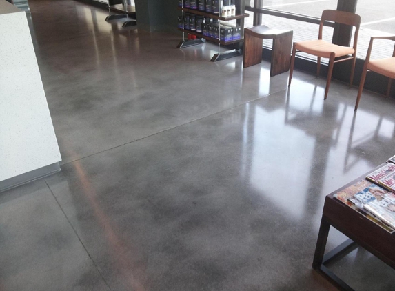 EZE Decor Concrete. Micro-topping with gray chemicals stain