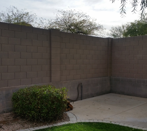 Building Block Masonry - Phoenix, AZ. Block fence on top of retaining wall