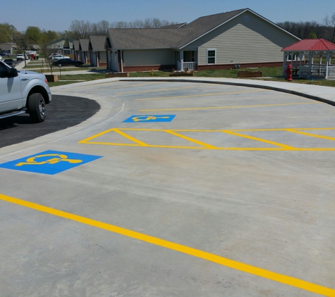 Striper John's Pavement Specialist - Wichita, KS. Curved parking.