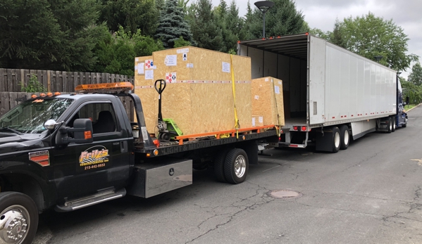 Fritz’s Towing - Warminster, PA. Off loading a TT for Abington hospital 