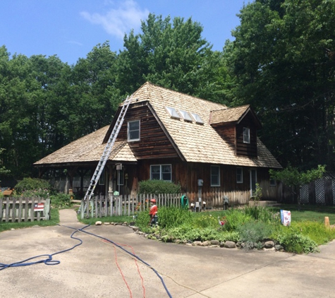 Roof Cleaner - Grand Rapids, MI. Cedar roof cleaning and repair by Roof Cleaner 616.240.3465