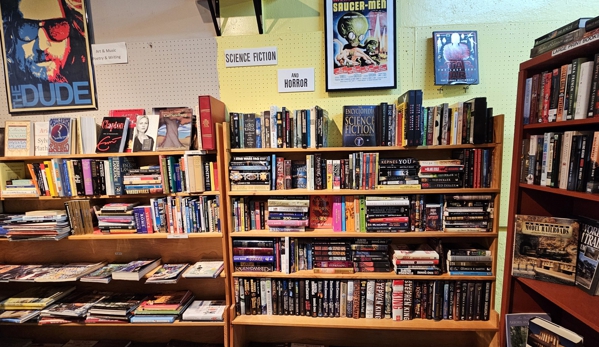 Joy of Books - Hendersonville, NC. Bill Lewis of Vero Beach, Florida, checking out the Joy of Books while visiting Hendersonville, North Carolina.