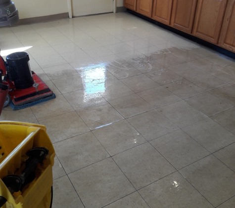 Southwest Maintenance - Yuma, AZ. Removing dirty floor wax. (Before)