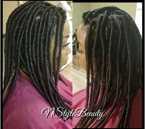 Rochelle Cooper inside The Salon at Shop One Studios - Tulsa, OK. Individual crochet locs