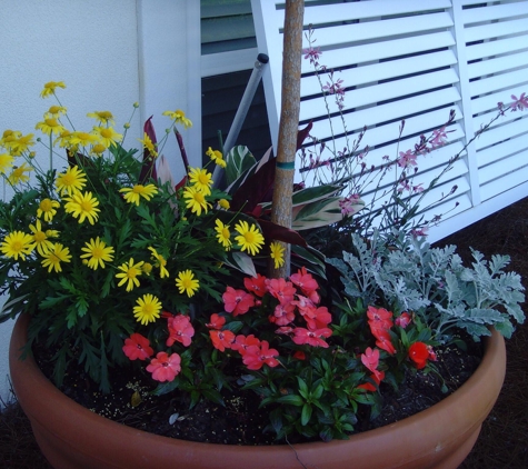 Garvey Irrigation Inc - Pensacola, FL. Attractive flower pots make any entry welcoming.