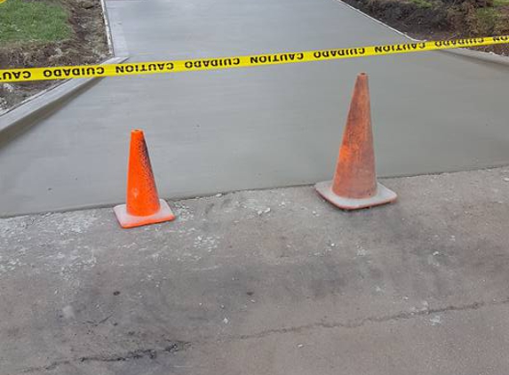 Tom Bushur Concrete Constr - Mattoon, IL. My husband smiles every time he pulls in the driveway!!  Called "the landing strip"