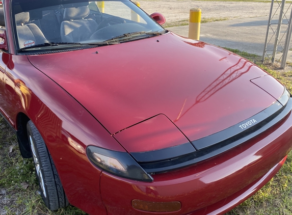 Affordable Auto Painting - Fort Pierce, FL. Car was painted four years ago from when this picture was taken. No peeling no cracking no fading $700 job.