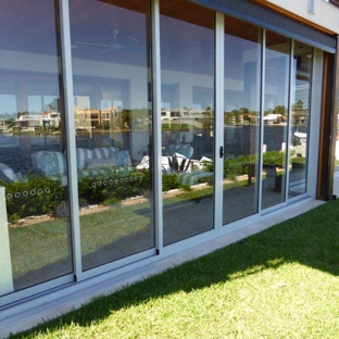 Noosa Door Centre. Aluminium and glass sliding Stacking Doors.