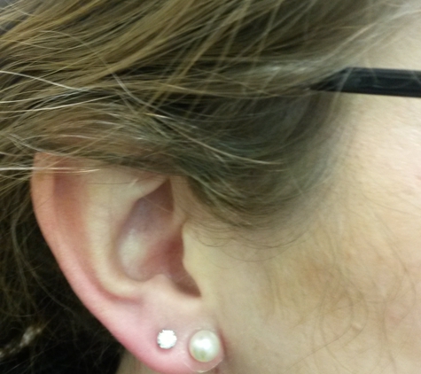 Zaraz Collection - Lynbrook, NY. Helene from East Rockaway got both ears pierced and left beaming