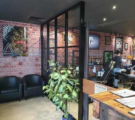 Beyond The Illusion Tattoo Parlour - Secret Harbour, WA. Beyond the Illusion Tattoo Parlour, Secret harbour, spacious modern decor and client seating area