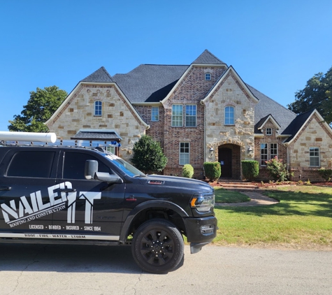 Nailed It Roofing and Construction - Arlington, TX. Two story home with a steep roof? We have you covered! This roof was installed after a major wind storm. - Southlake, TX