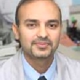 Dr. Adil Alavi, MD