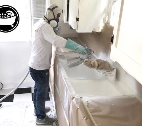 Bathtub Refinishing And Fiberglass Expert - Los Angeles, CA. Technician is spraying a kitchen sink double bowl. By Bathtub Refinishing And Fiberglass Expert